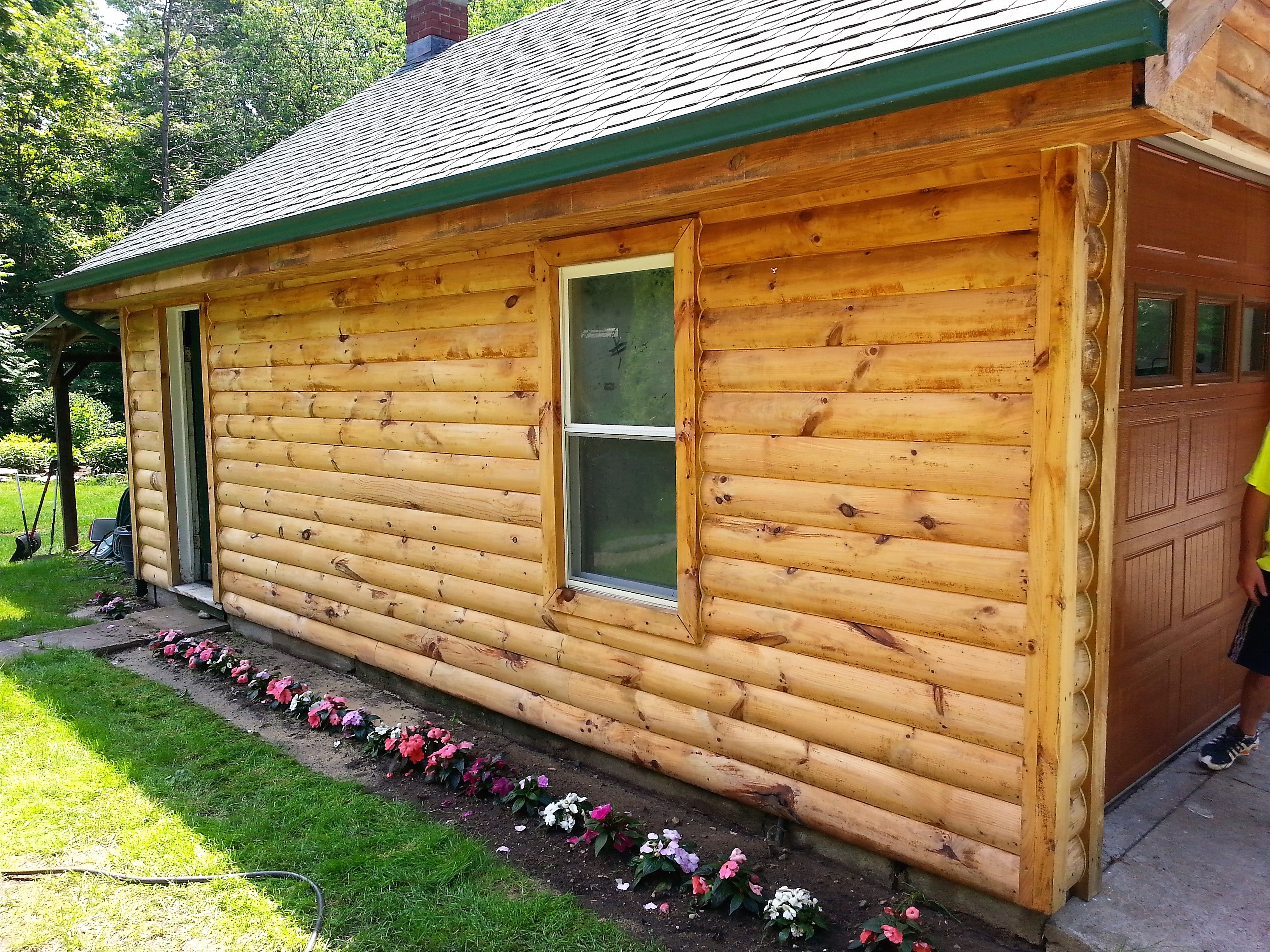 Log cabin siding after cleaning - clean natural wood